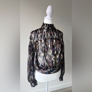 Olivaceous Sheer High-Neck Blouse in Black, White & Blue Accents